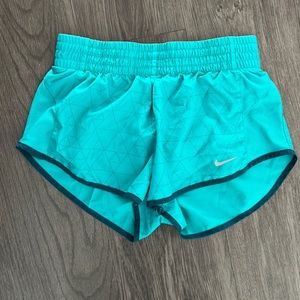 Teal and turquoise Nike dry fit athletic shorts